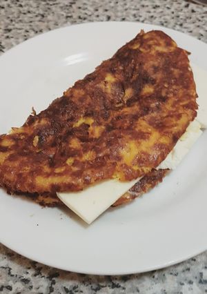 Una foto de Cachapas con queso llanero y mantequilla