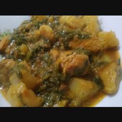 A picture of Shaljum Palak chicken.