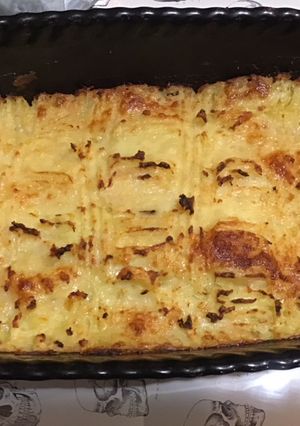 Une photo de Écrasée de pommes de terre gratinée aux deux fromages