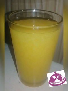 A picture of Orange and ginger juice.