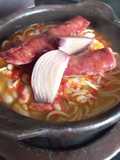 Porotos con riendas y longaniza