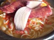 Una foto de poroto al escabeche