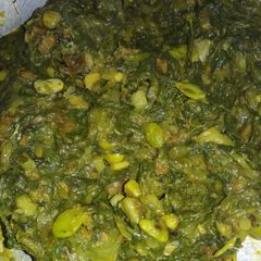 A picture of Spinach brinjal semphalli potato urad dal ki badi wali saag.