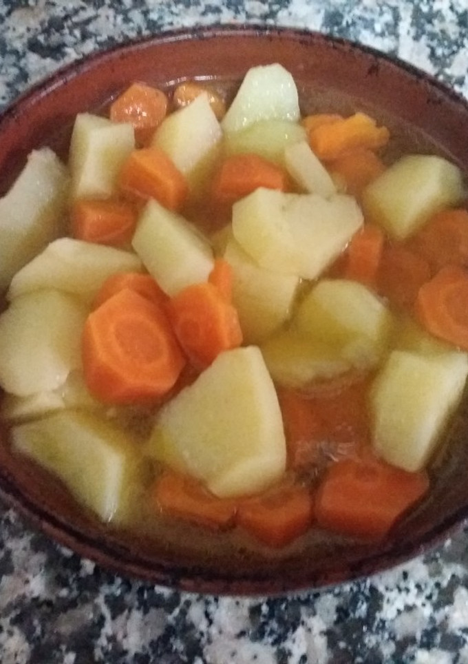 Una foto de Patatas y zanahoria