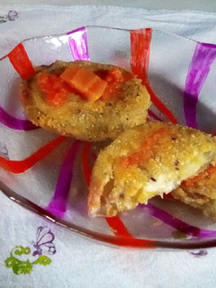 Una foto de Milanesas, berenjenas in carroza...🍆🎡