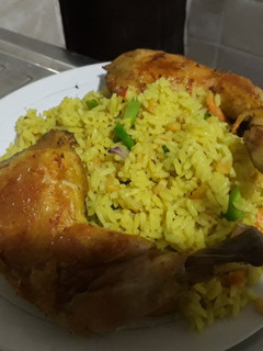 A picture of Fried rice with grilled chicken.