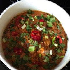 A picture of Aubergine curry in peanut sauce.