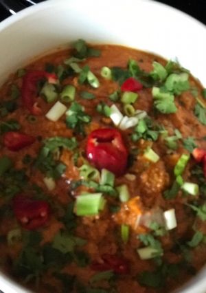 A picture of Aubergine curry in peanut sauce.
