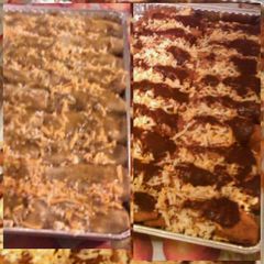 A picture of Chicken enchiladas with green chili sauce or red sauce.