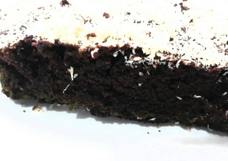 Chocolate cake with coconut flakes topping