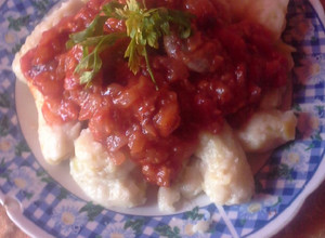Una foto de Ñoquis con salsa bolognesa