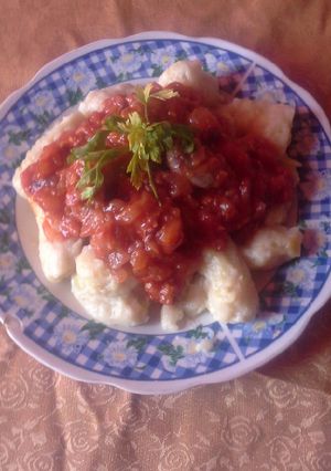 Una foto de Ñoquis con salsa bolognesa