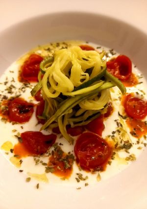 A picture of Zucchini Noodles with Burrata and Caramelized Tomatoes.