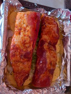 Una foto de Costillas adobadas con patatas panaderas al horno