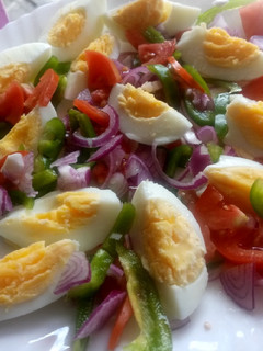 A picture of Hard boiled eggs salad.