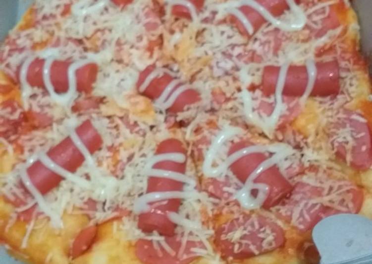 Pizza empuk menul -menul