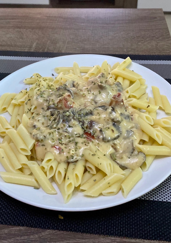 Una foto de Pasta con bechamel y champiñones