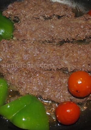 A picture of Iranian pan kebab (kebab tabei کباب تابه ای).