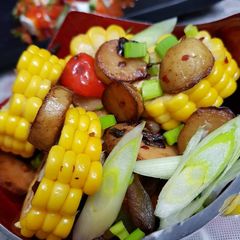 A picture of Roasted baby potato with corn salad.