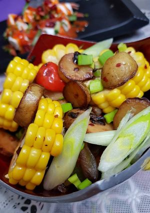 A picture of Roasted baby potato with corn salad.