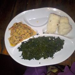 A picture of Ugali, zucchini eggs and mixed veggies.