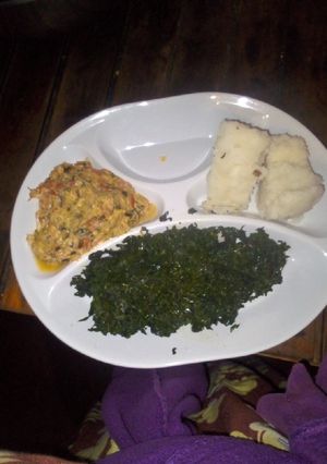 A picture of Ugali, zucchini eggs and mixed veggies.