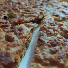 Pizza paratha A picture of Pizza paratha.