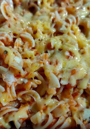 A picture of Cheese tomato macaroni pasta.
