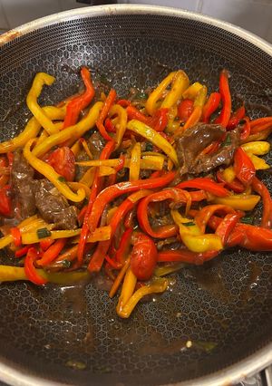 A picture of Marinated Beef with Bell Peppers and Cherry Tomatoes.