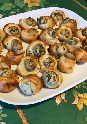 Une photo de Feuilletés fromage,crème,champignons et persil