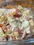 Salade de concombre et tomates à l’ananas, crème et oignon doux