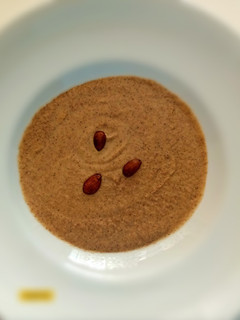 Una foto de Crema de coliflor con almendras