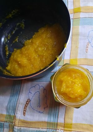 Una foto de Dulce casero de manzana y mandarinas