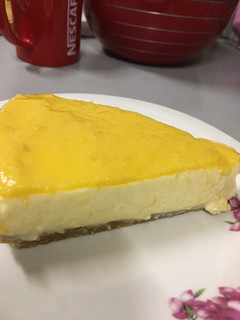 Una foto de Cheesecake de mango