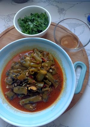 Une photo de Des fèves vert en sauce