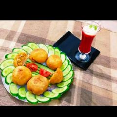 A picture of Smoky chicken kachori.