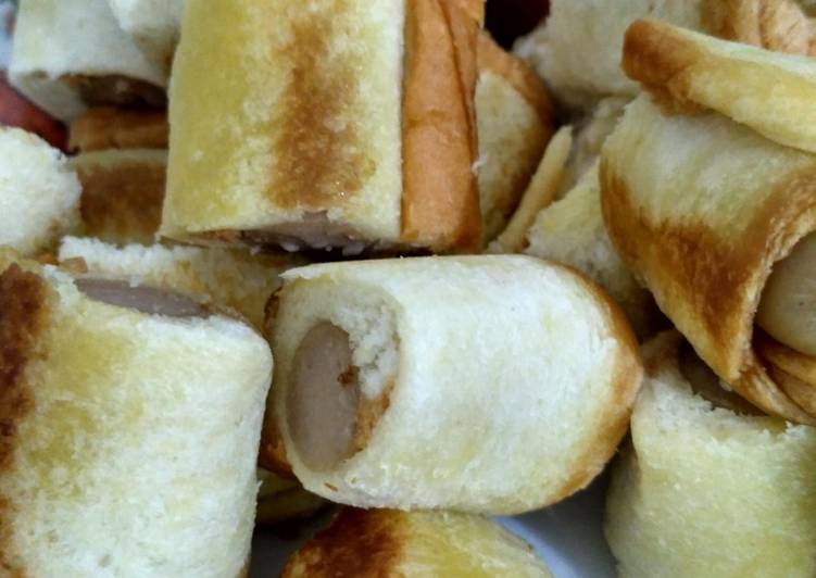 Bagaimana Membuat Roti tawar gulung sosis Anti Gagal