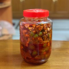 A picture of Raw mango pickle/ achar.