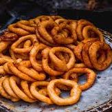 Sel Roti (rice flour donuts) (Nepal) A picture of Sel Roti (rice flour donuts) (Nepal).
