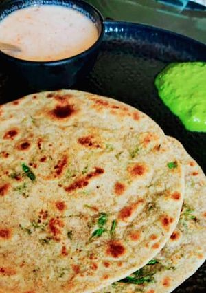 A picture of Foxtail Millets peanut Rotla with mayo Sauce and green chutney.
