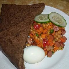 Chocolate bread with baked beans sauce, boiled egg & few slices of any veg of your choice A picture of Chocolate bread with baked beans sauce, boiled egg & few slices of any veg of your choice.