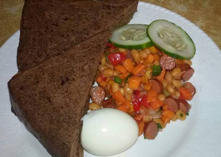Chocolate bread with baked beans sauce, boiled egg &amp; few slices of any veg of your choice
