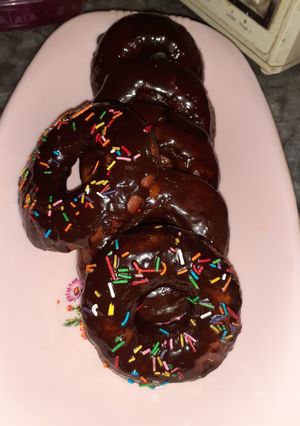 A picture of Chocolate icing doughnuts.