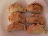 Empanadas de lomo al vino desmenuzado
