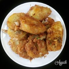 A picture of Fried sweet potato coated with egg.