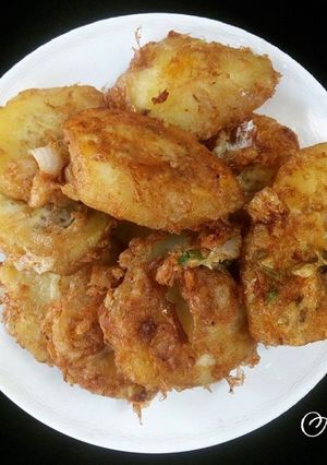 A picture of Fried sweet potato coated with egg.