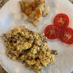 A picture of Scrambled Eggs with Sausage & Potatoes.
