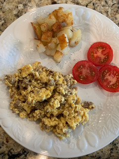 A picture of Scrambled Eggs with Sausage & Potatoes.