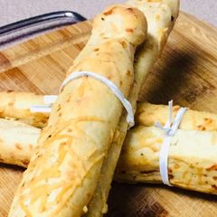 A picture of Black pepper and Parmesan Grissini.