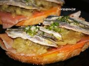Una foto de boquerones anchoa